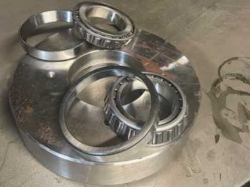 Trommel thrust wheel replacement
